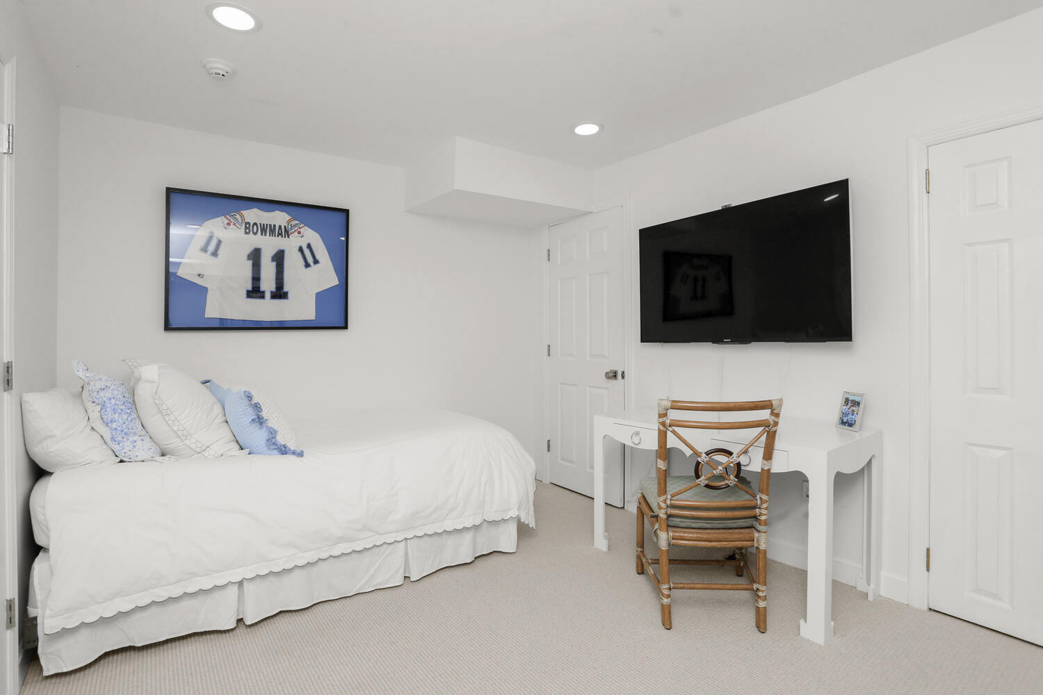 3 Pine Brook Lane Darien, CT 06820 - Photo 21 of 26 a bedroom with a bed and a flat screen tv