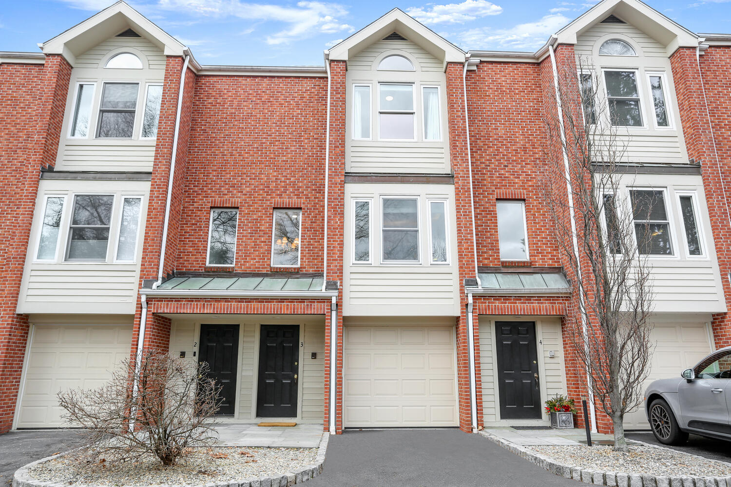 3 Pine Brook Lane Darien, CT 06820 - Photo 23 of 26 a front view of a house with a yard
