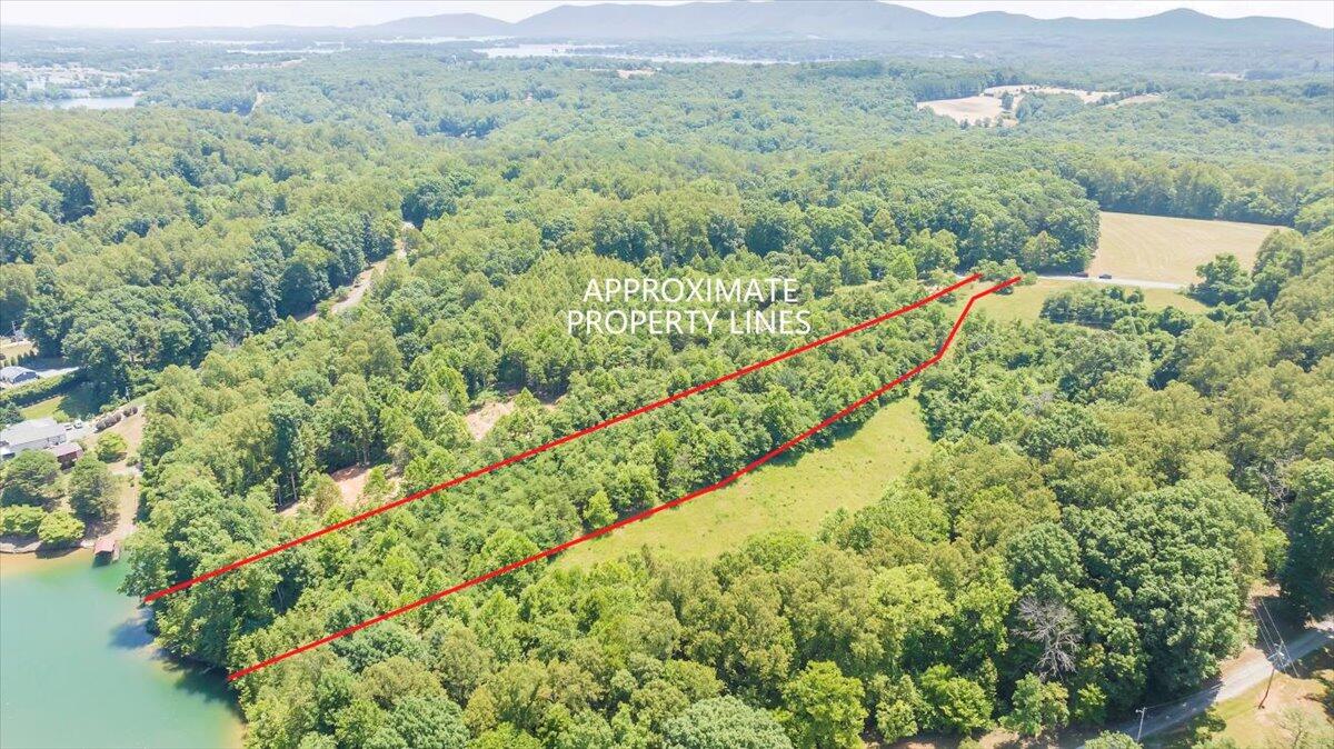 Lot 1 Piney Point Road Union Hall, VA 24176 - Photo 2 of 30 a view of a lush green field with mountains in the background