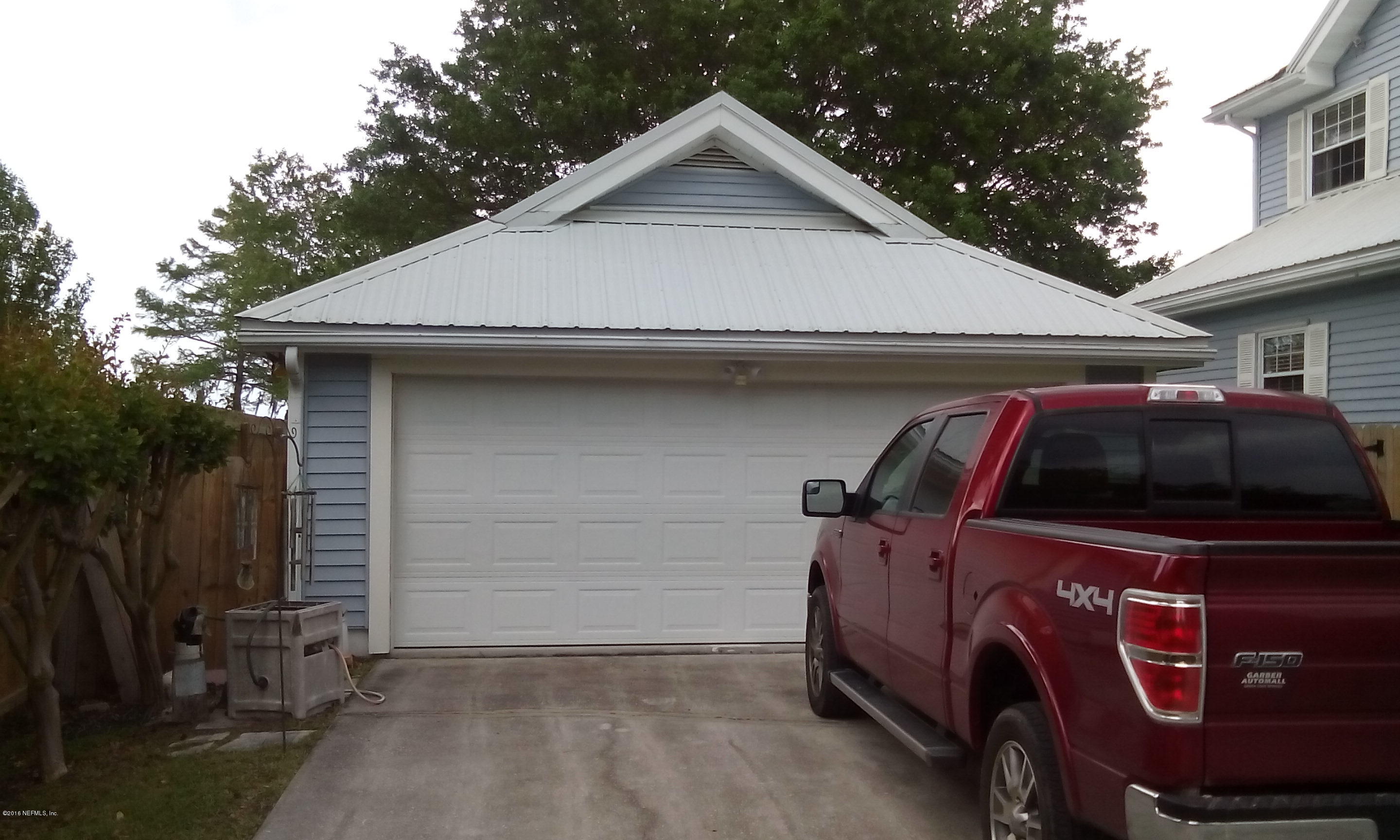 275 Brickyard Road Middleburg, FL 32068 - Photo 13 of 44 a view of garage and car parked
