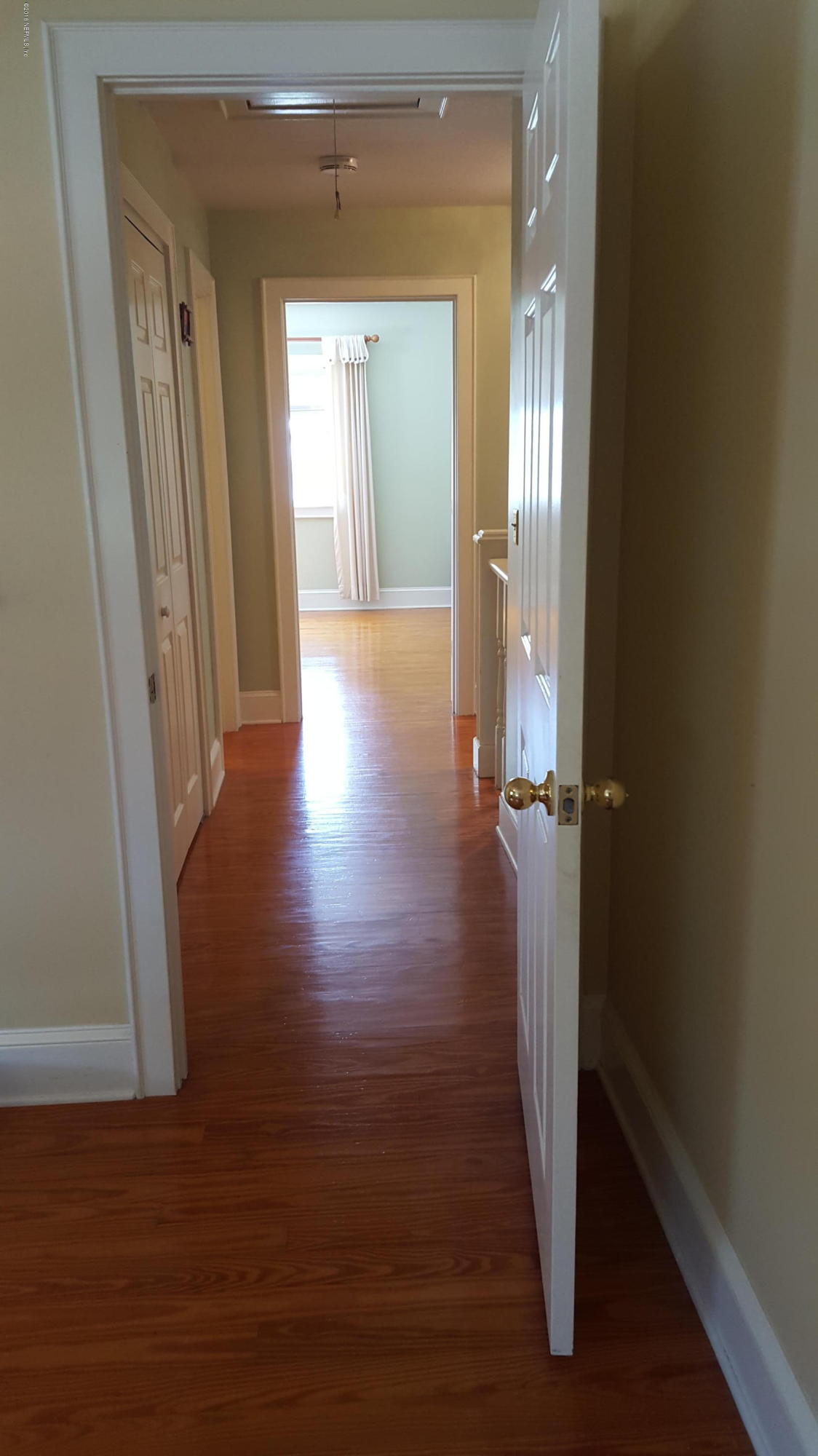 275 Brickyard Road Middleburg, FL 32068 - Photo 31 of 44 a view of a room with wooden floor and a window