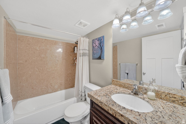 7872 Farm House Lane Midvale, UT 84047 - Photo 30 of 39 Fourth Bathroom with a white tub and a beige-patterned shower surround