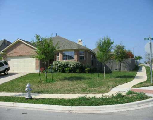 2000 Maize Bend Drive Austin, TX 78727 - Photo 1 of 1 a front view of a house with a yard