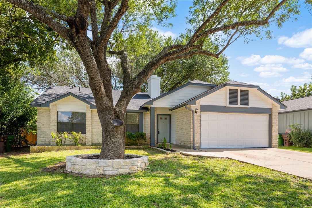 1813 Laurel Path Round Rock, TX 78664 - Photo 1 of 1 a front view of a house with a yard and garage
