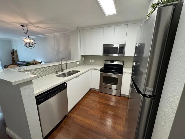 a view of a car parked in front of a house