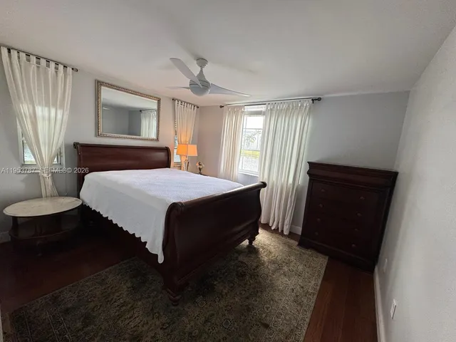 a room with gym equipment and a large window