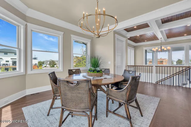 a kitchen with granite countertop stainless steel appliances a sink and cabinets