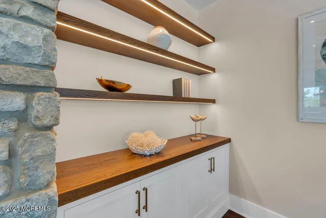a kitchen with stainless steel appliances granite countertop a sink and stove