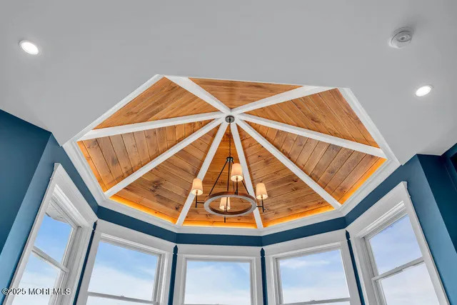 a bathroom with a sink vanity and toilet