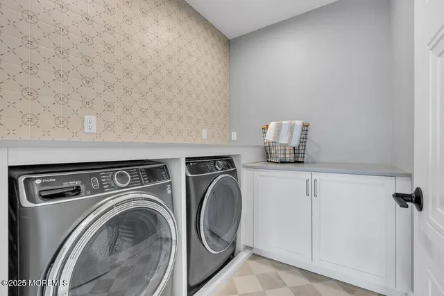 a kitchen with stainless steel appliances granite countertop a stove and a sink