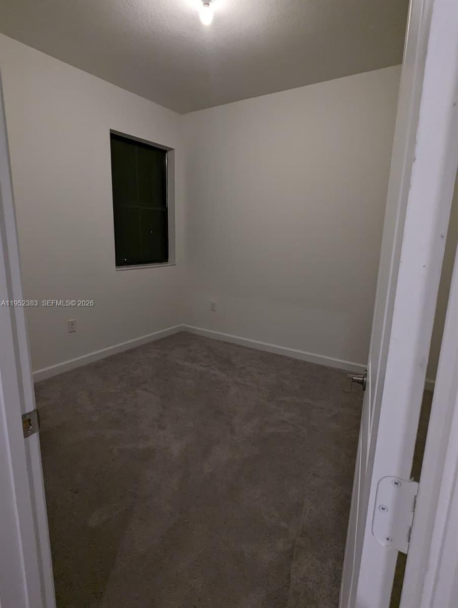28661 Southwest 132nd Place Homestead, FL 33033 - Photo 13 of 16 a view of an empty room