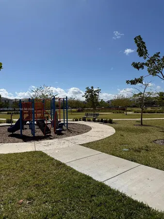 a view of a park with lots of trees
