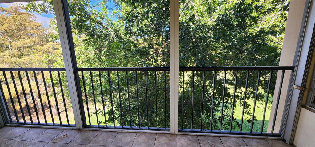 4168 Inverrary Drive, Unit 401 Lauderhill, FL 33319 - Photo 18 of 22 a view of a street from a balcony