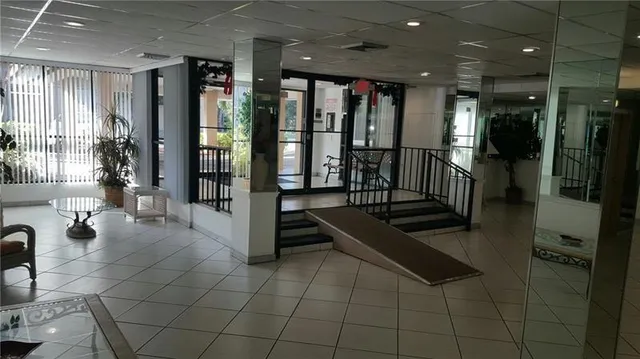 a lobby with furniture