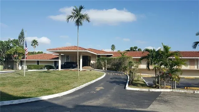 a view of backyard with green space