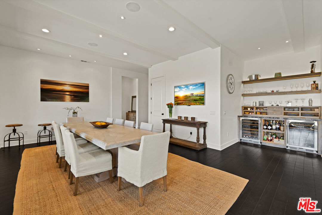 28850 Hampton Place Malibu, CA 90265 - Photo 11 of 58 a living room with stainless steel appliances furniture and a flat screen tv