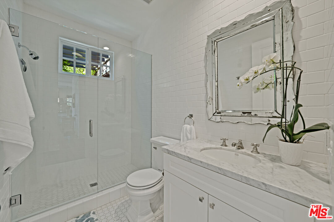 28850 Hampton Place Malibu, CA 90265 - Photo 16 of 58 a bathroom with a sink a toilet and shower