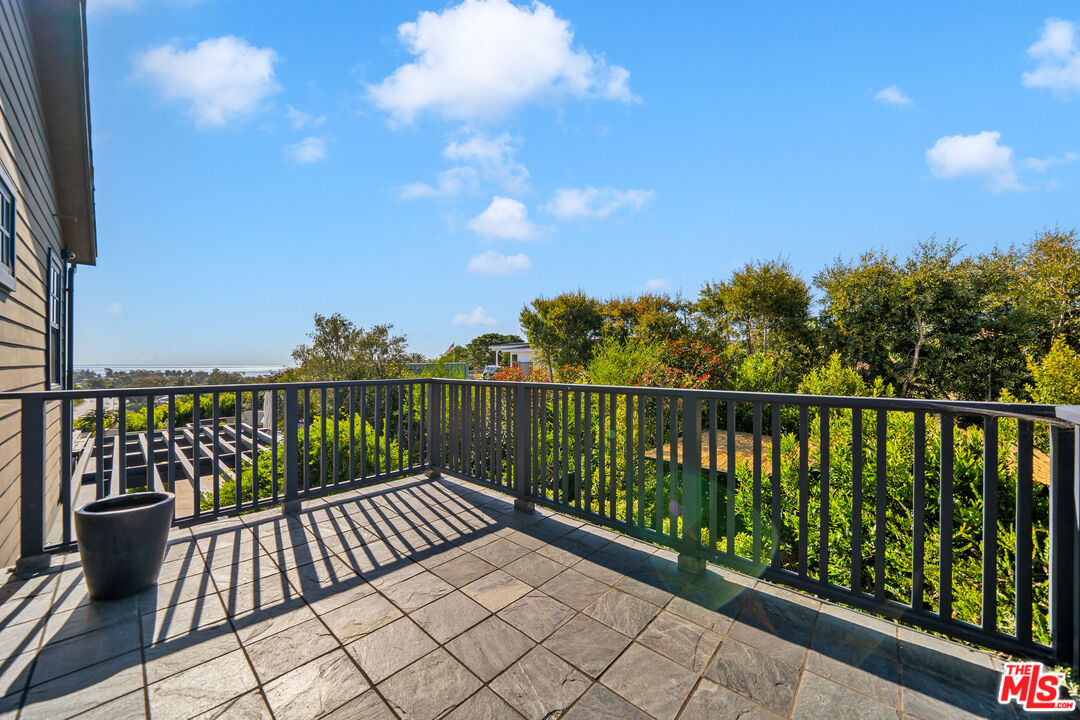 28850 Hampton Place Malibu, CA 90265 - Photo 19 of 58 a balcony with wooden floor in outdoor space