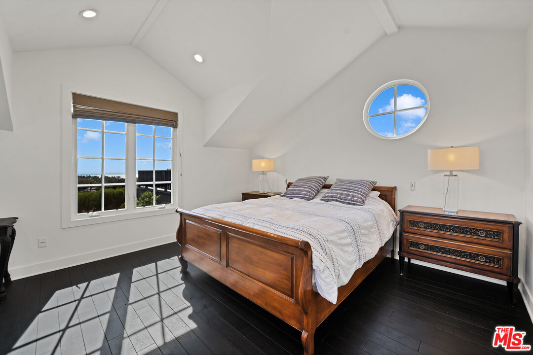 28850 Hampton Place Malibu, CA 90265 - Photo 29 of 58 a bedroom with a bed and a window