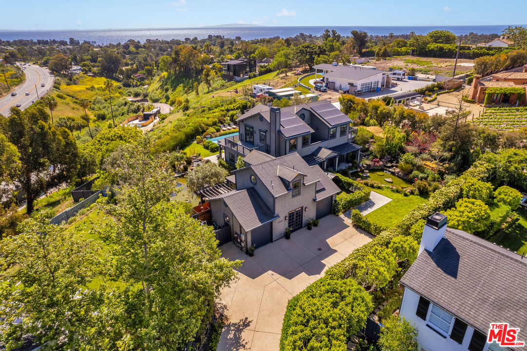 28850 Hampton Place Malibu, CA 90265 - Photo 3 of 58 an aerial view of a house with a yard