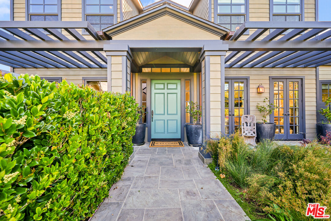 28850 Hampton Place Malibu, CA 90265 - Photo 4 of 58 a view of a house with potted plants