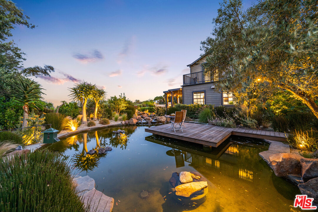 28850 Hampton Place Malibu, CA 90265 - Photo 43 of 58 a view of swimming pool with outdoor seating and city view