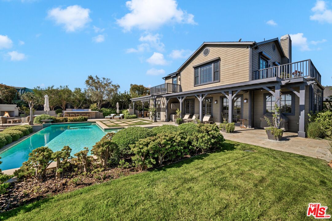 28850 Hampton Place Malibu, CA 90265 - Photo 45 of 58 a front view of a house with a yard