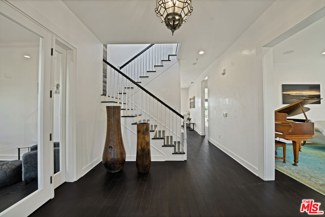 28850 Hampton Place Malibu, CA 90265 - Photo 5 of 58 a view of entryway and hall with wooden floor