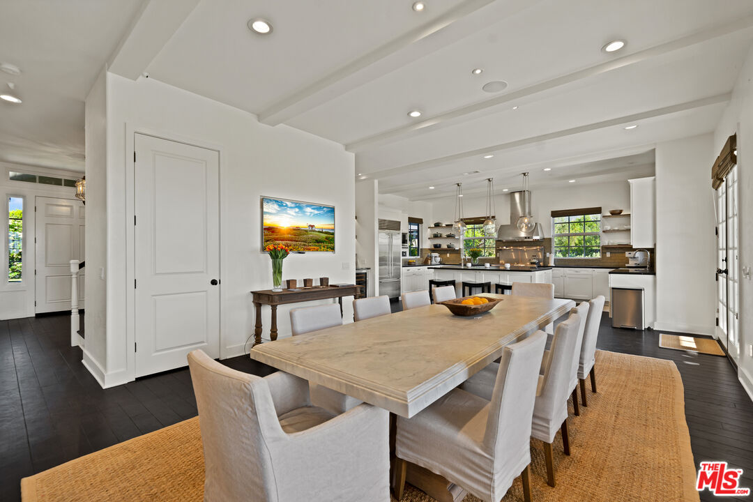 28850 Hampton Place Malibu, CA 90265 - Photo 10 of 58 a view of a dining room with furniture and wooden floor