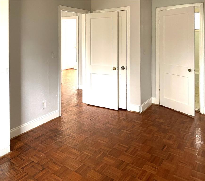 1443 Oxford Road Northeast, Unit 2 Atlanta, GA 30307 - Photo 7 of 9 a view of an empty room