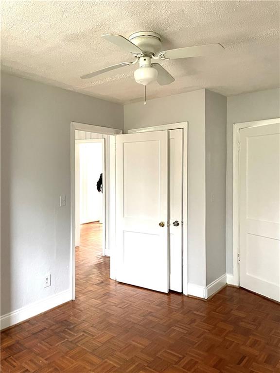 1443 Oxford Road Northeast, Unit 2 Atlanta, GA 30307 - Photo 9 of 9 wooden floor in an empty room with a window