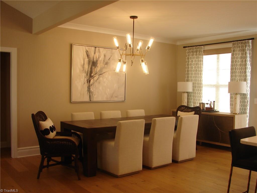 4034 Waterview Road High Point, NC 27265 - Photo 8 of 31 Open dining for entertaining seats 8 comfortably