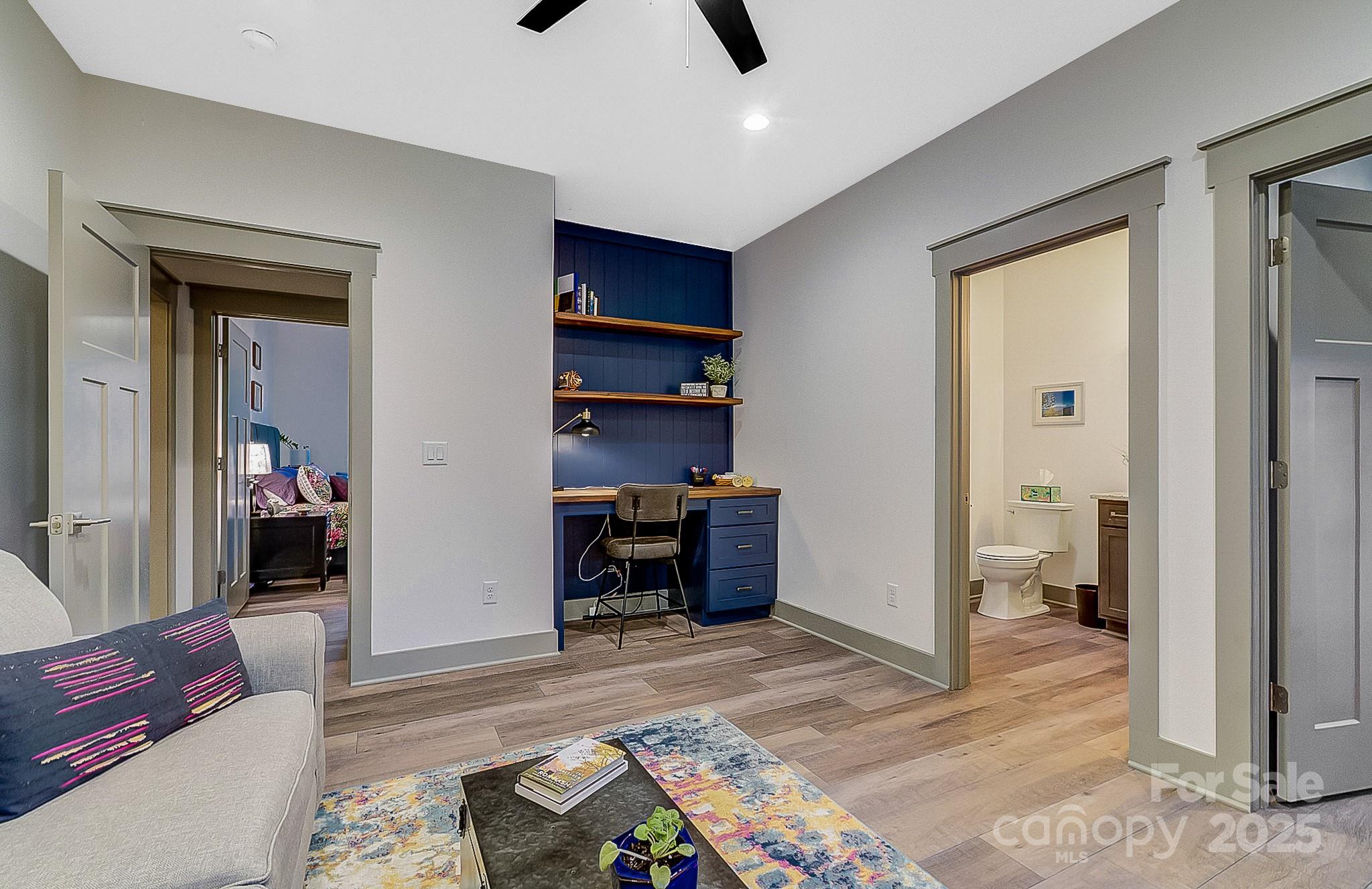 250 Judson Ridge Road Arden, NC 28704 - Photo 15 of 47 a bedroom with a bed and furniture