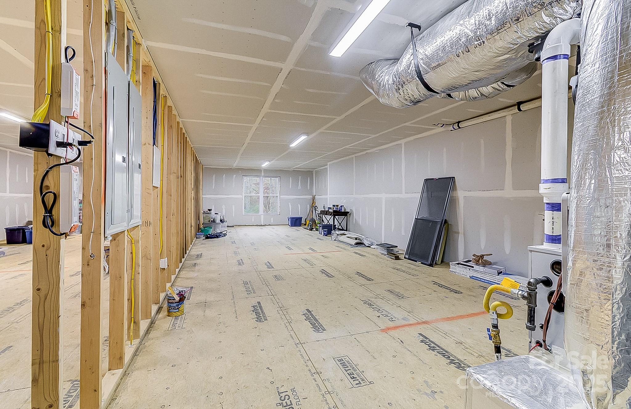 250 Judson Ridge Road Arden, NC 28704 - Photo 17 of 47 a view of a livingroom with furniture and a window