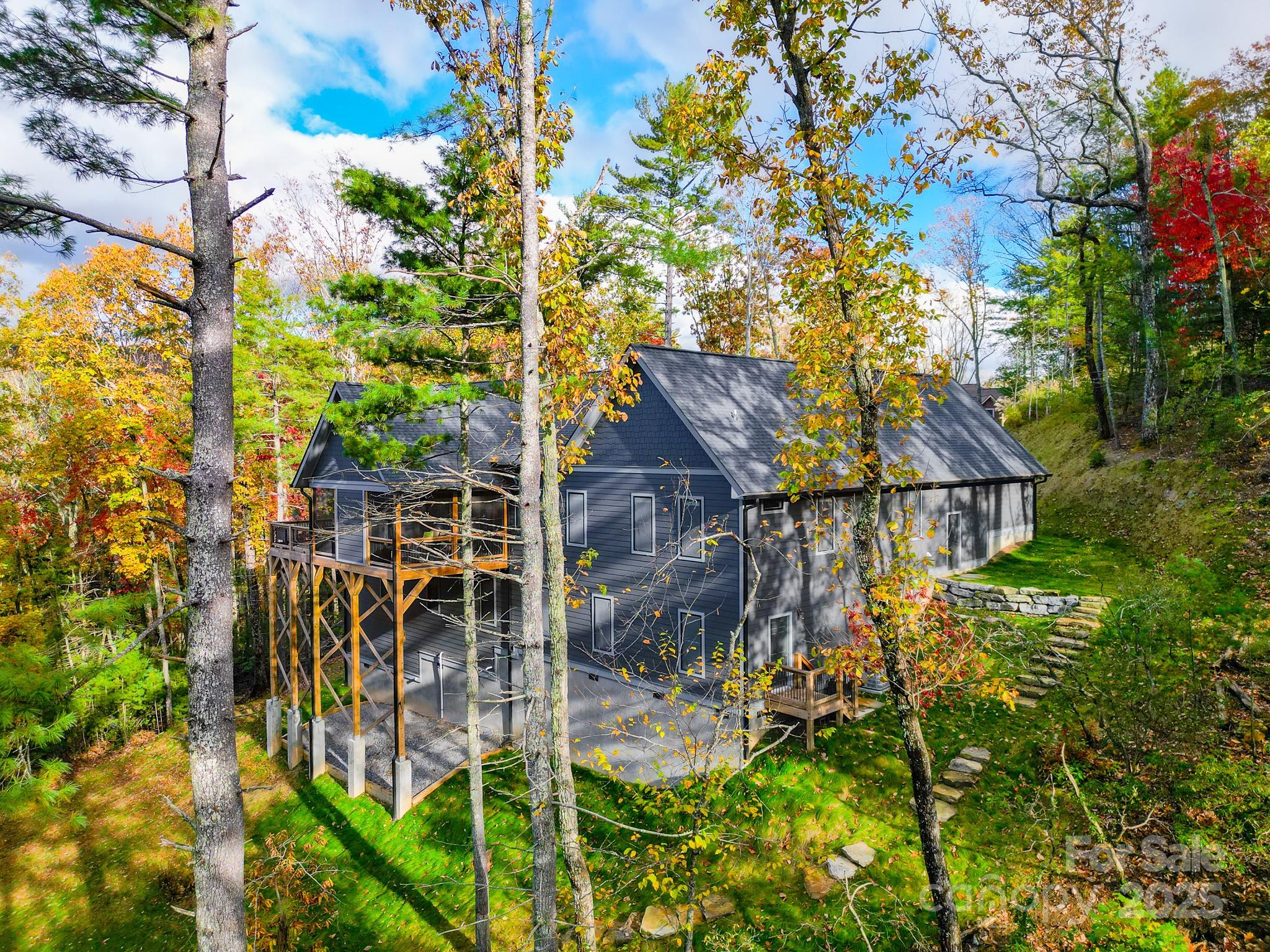 250 Judson Ridge Road Arden, NC 28704 - Photo 21 of 47 a aerial view of a house with a yard