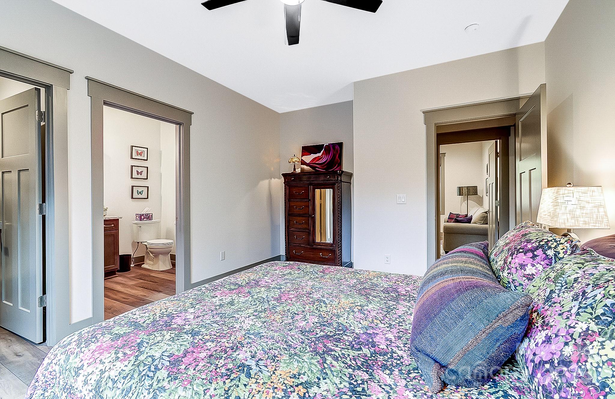 250 Judson Ridge Road Arden, NC 28704 - Photo 35 of 47 a bedroom with a bed and a dresser