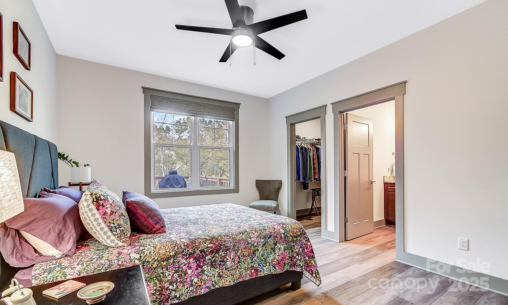 250 Judson Ridge Road Arden, NC 28704 - Photo 36 of 47 a bedroom with a bed and a window