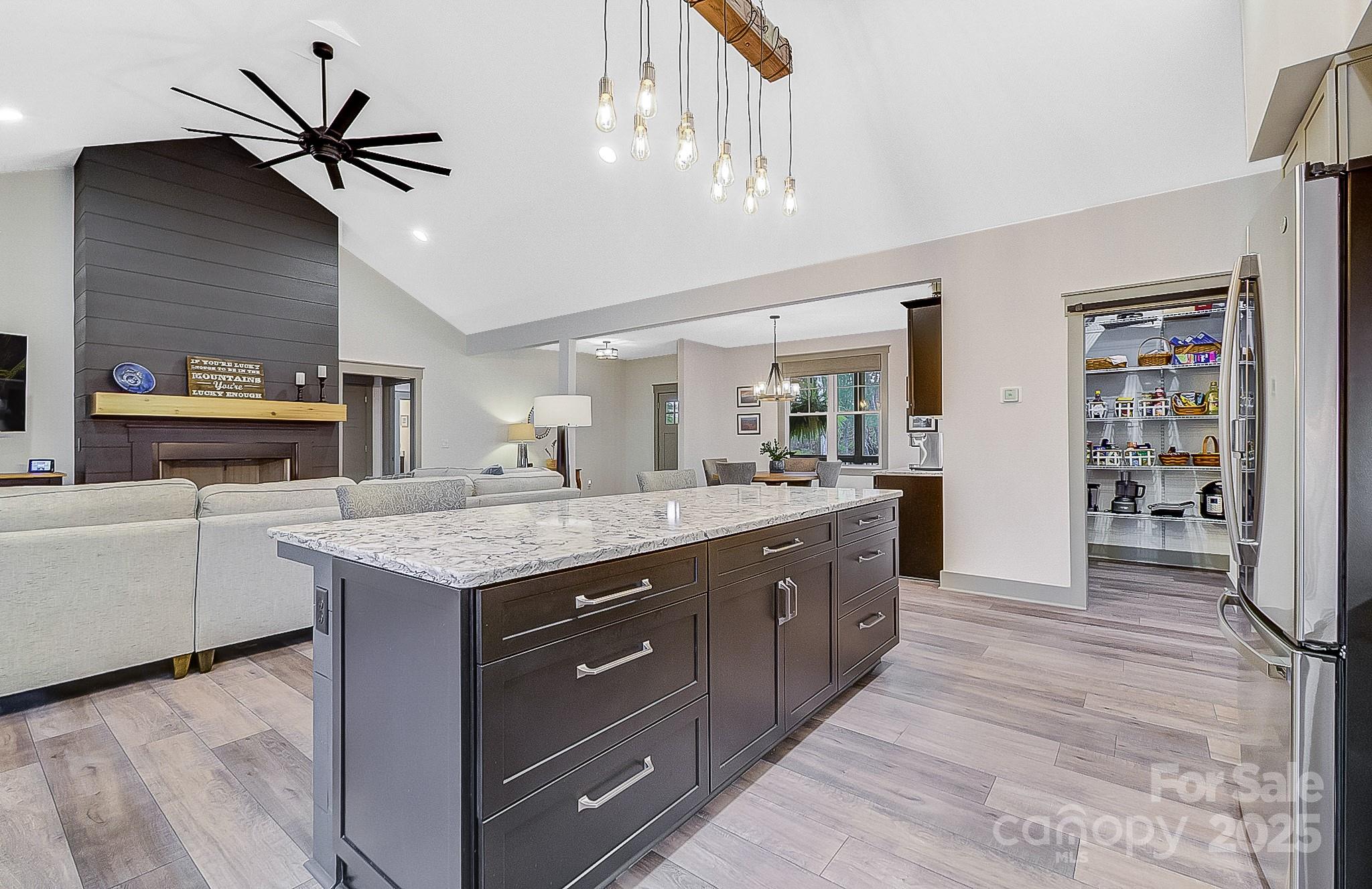 250 Judson Ridge Road Arden, NC 28704 - Photo 39 of 47 a spacious kitchen with stainless steel appliances granite countertop a sink and a stove
