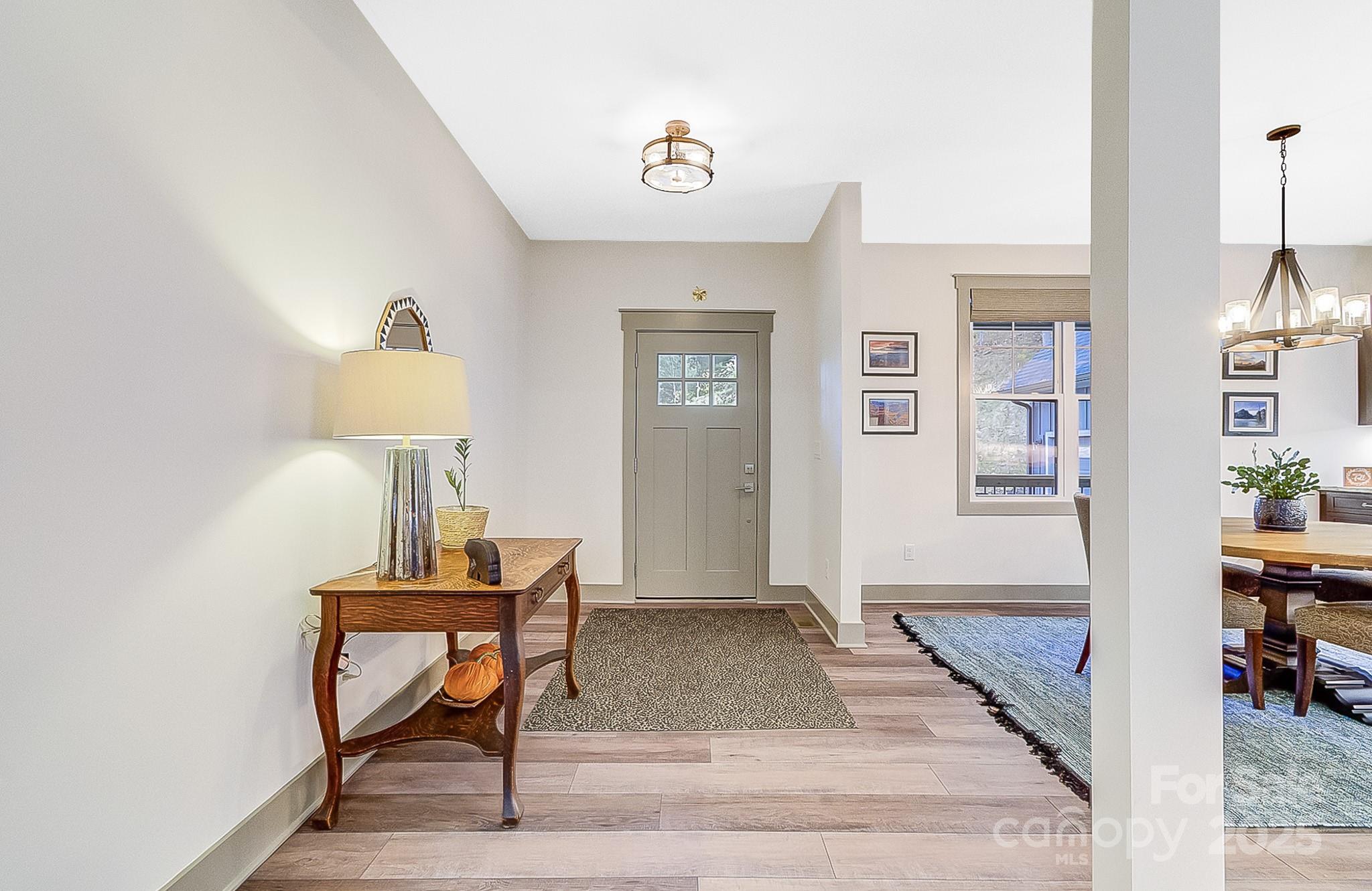250 Judson Ridge Road Arden, NC 28704 - Photo 4 of 47 a view of a livingroom with furniture and wooden floor
