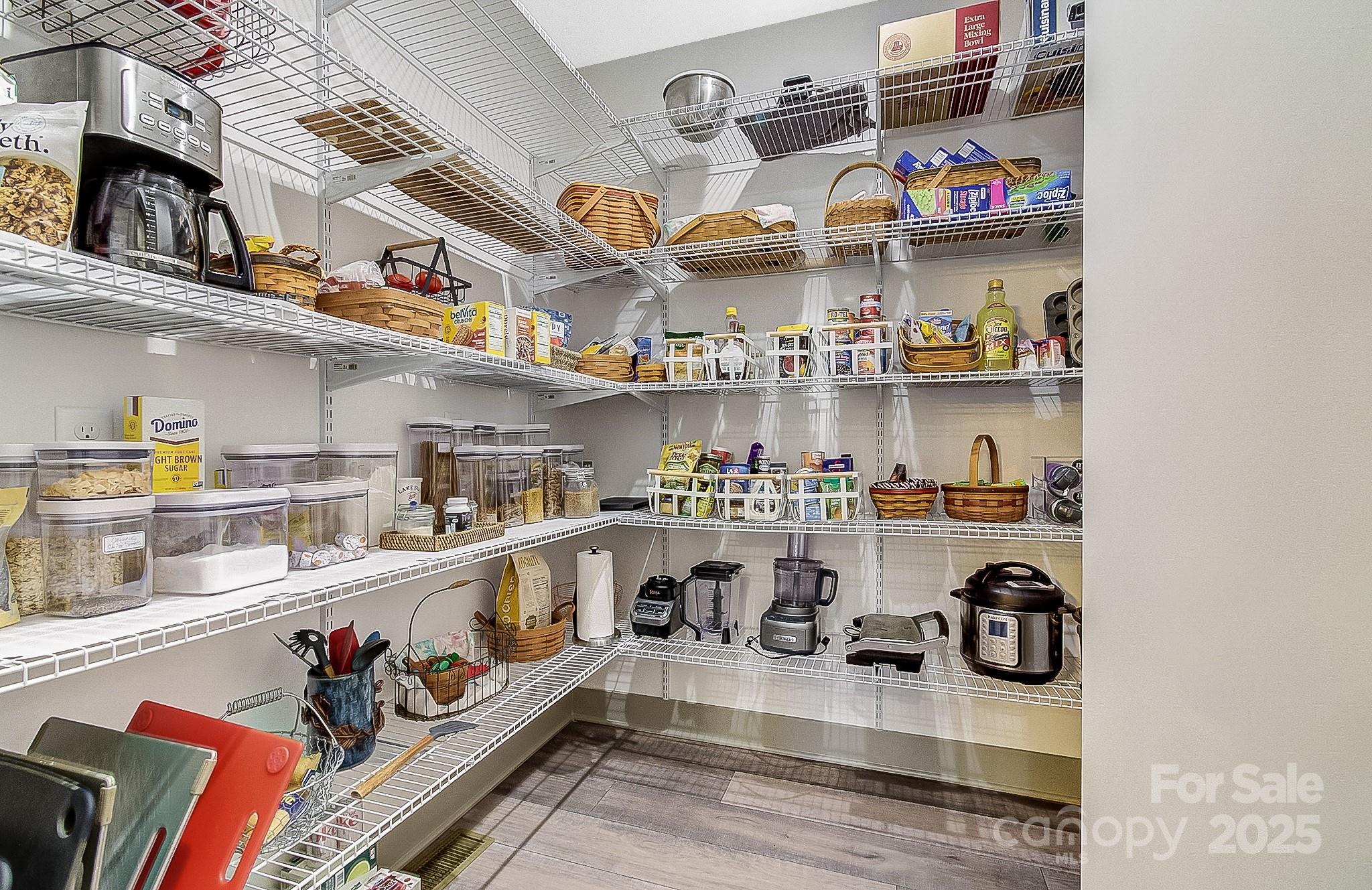 250 Judson Ridge Road Arden, NC 28704 - Photo 41 of 47 a kitchen with lots of bottles of alcohol