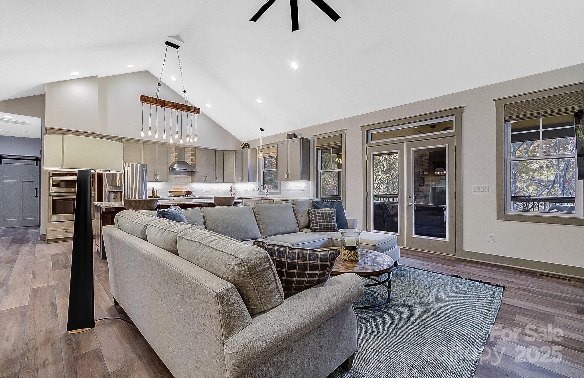 250 Judson Ridge Road Arden, NC 28704 - Photo 44 of 47 a living room with furniture and kitchen view