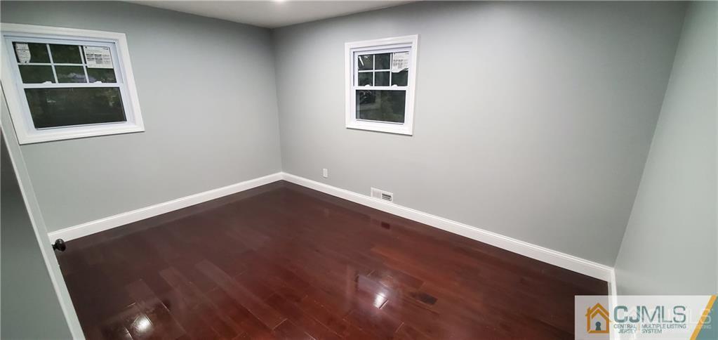 10 Huntington Road Edison, NJ 08820 - Photo 15 of 32 an empty room with a window
