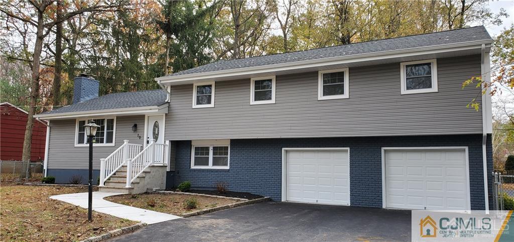 10 Huntington Road Edison, NJ 08820 - Photo 2 of 32 a front view of a house
