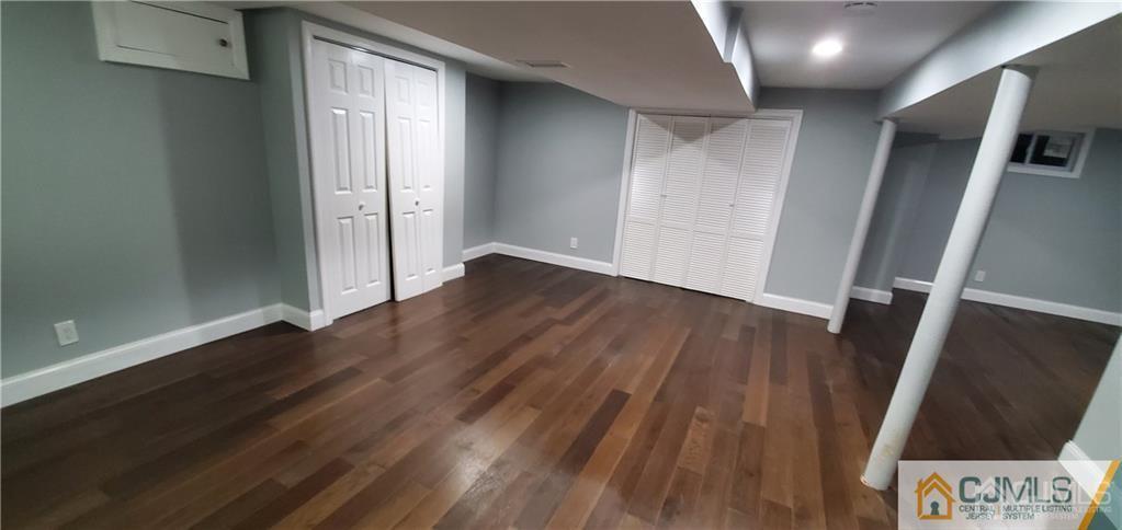 10 Huntington Road Edison, NJ 08820 - Photo 25 of 32 wooden floor in an empty room