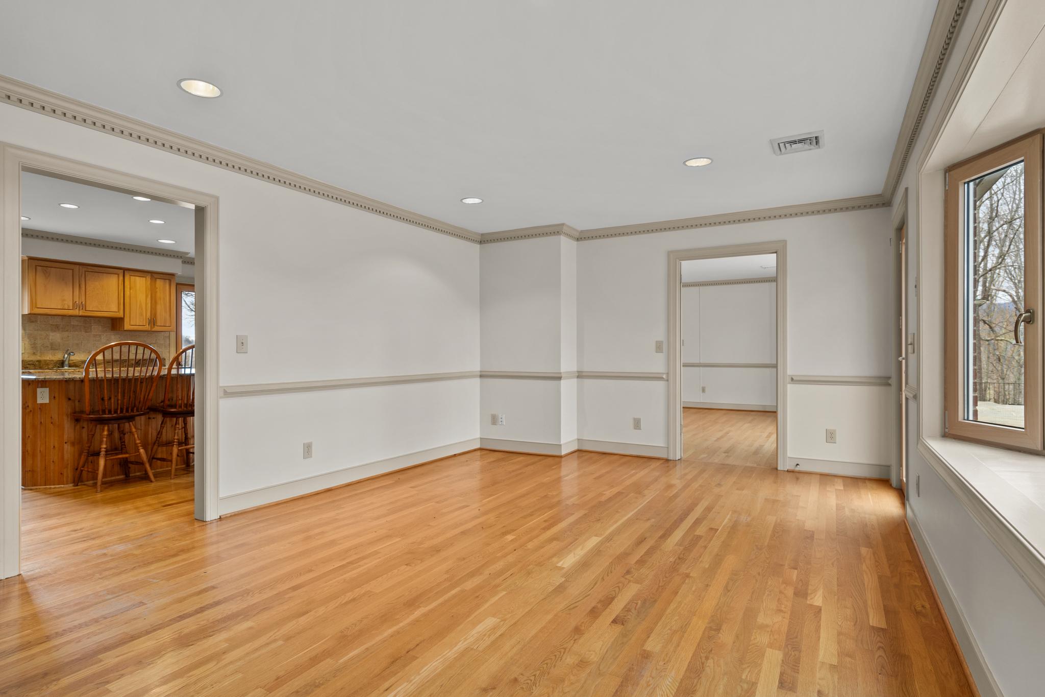 94 Old Hollow Road Sperryville, VA 22740 - Photo 11 of 38 wooden floor in an empty room with a window