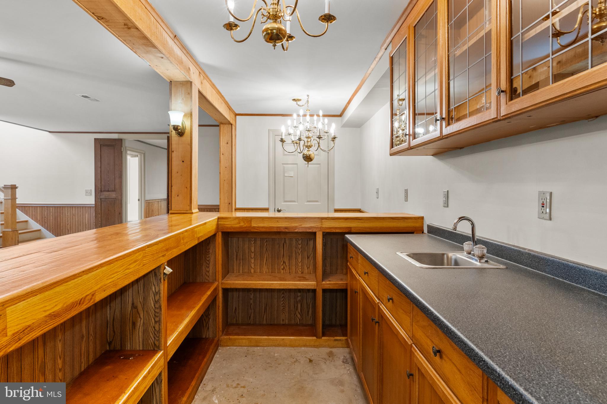 94 Old Hollow Road Sperryville, VA 22740 - Photo 19 of 38 a kitchen with a sink and cabinets