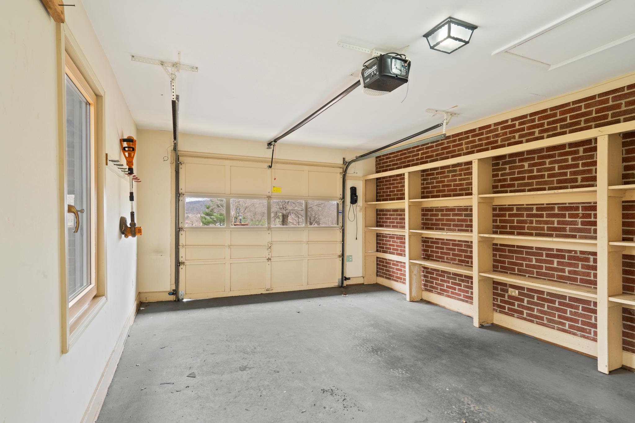 94 Old Hollow Road Sperryville, VA 22740 - Photo 23 of 38 a view of an empty room with a window
