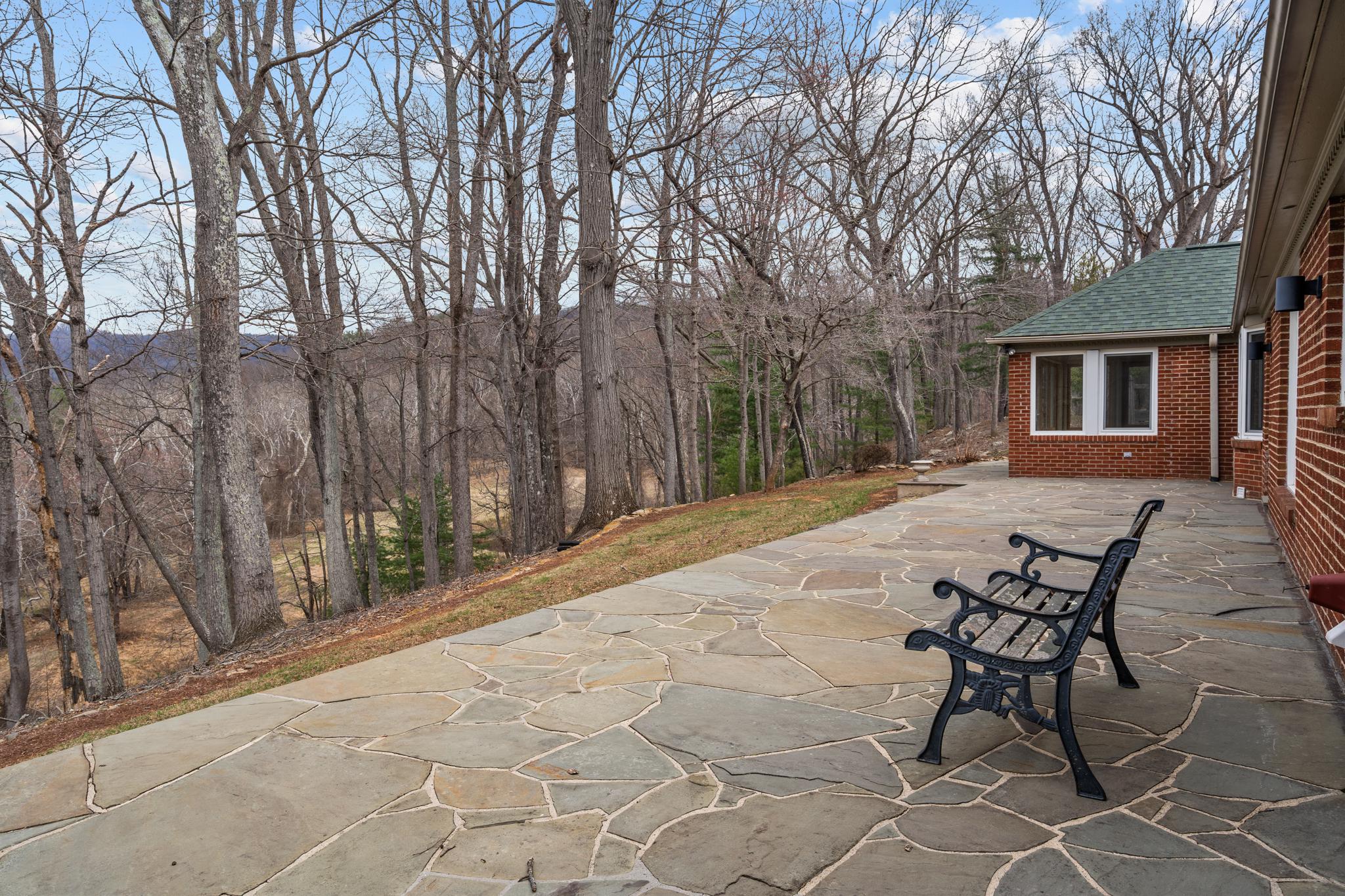94 Old Hollow Road Sperryville, VA 22740 - Photo 25 of 38 a view of a backyard with sitting area