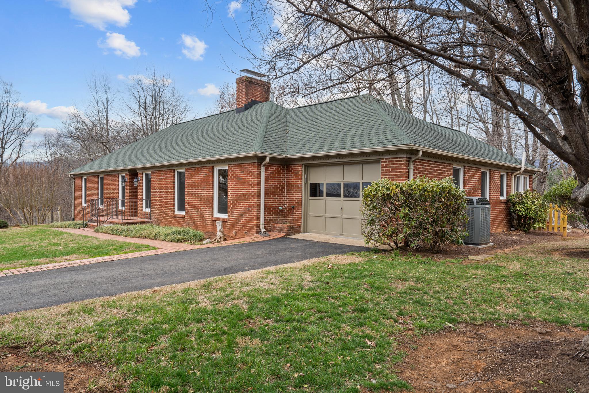 94 Old Hollow Road Sperryville, VA 22740 - Photo 35 of 38 a view of a house with a yard and large tree