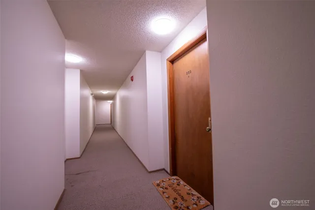 a view of hallway with stairs